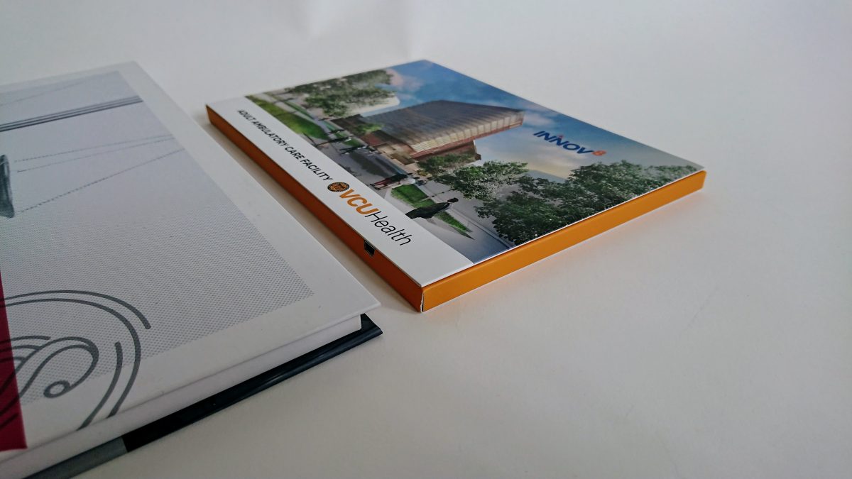 comparison of hardcover and softcover video brochures