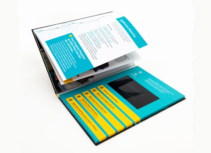 A4 hardcover video brochure with bound pages falling open
