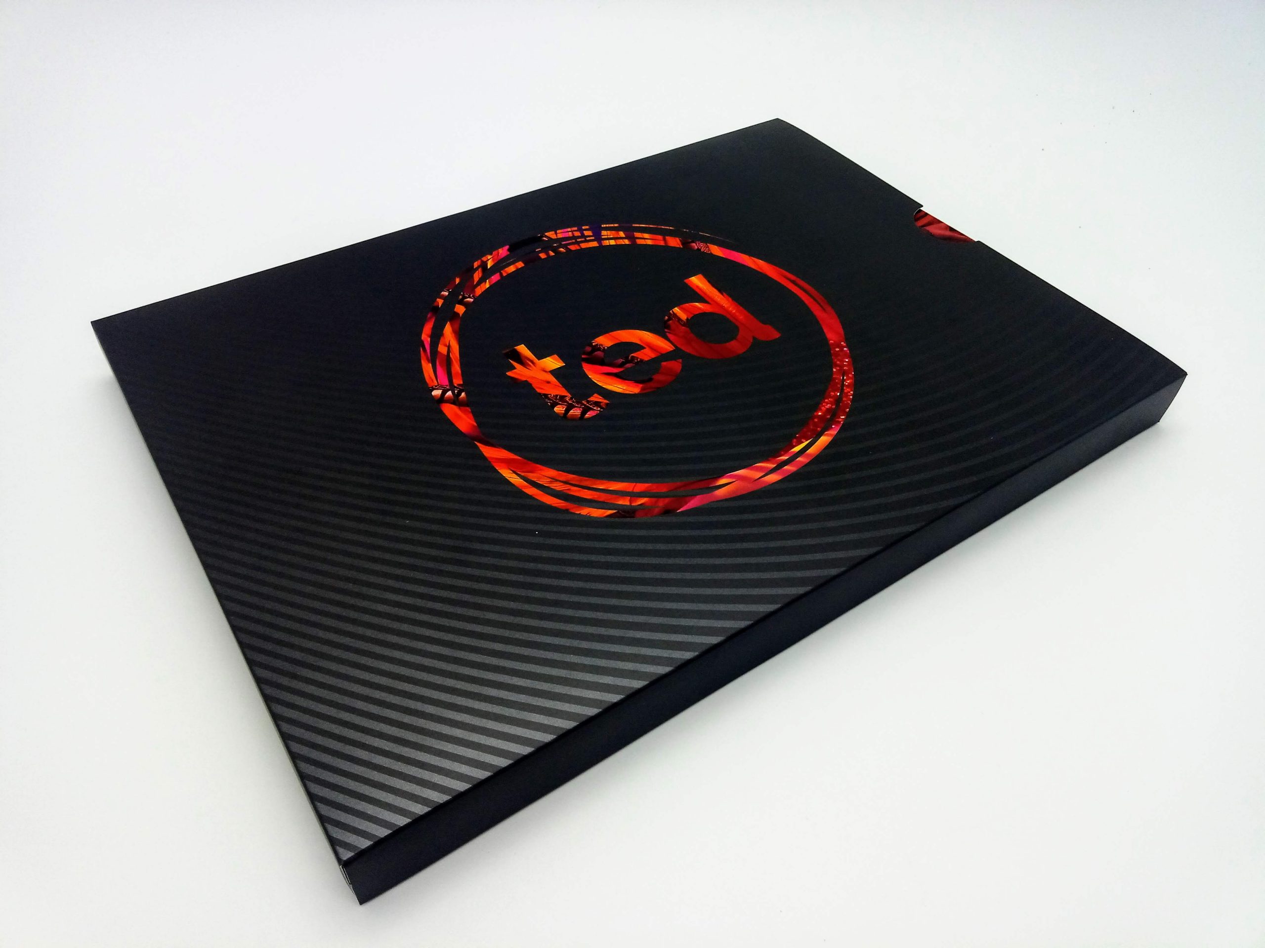 10-inch hardcover video brochure's slip case featuring spot UV varnish